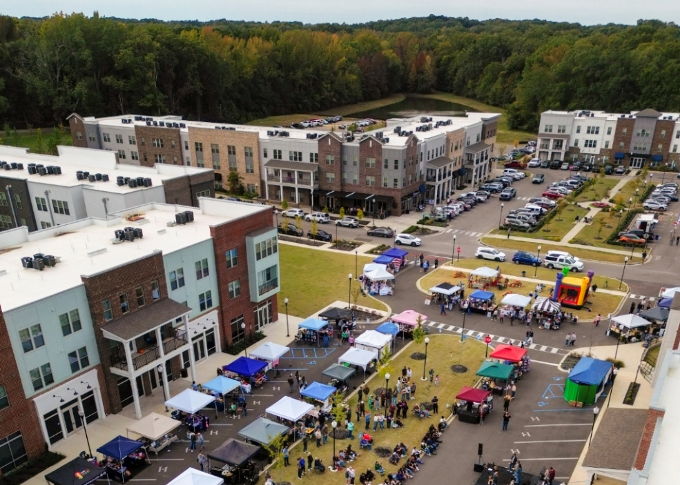 image showing people attending outdoor art festival.