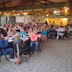 Chamber members eating luch at a recent meeting.
