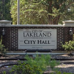 Sign in front saying Lakeland Town Hall.