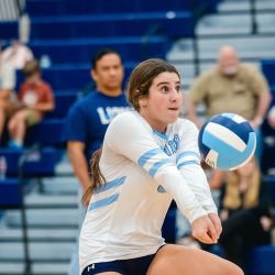 Ari hitting a volleyball