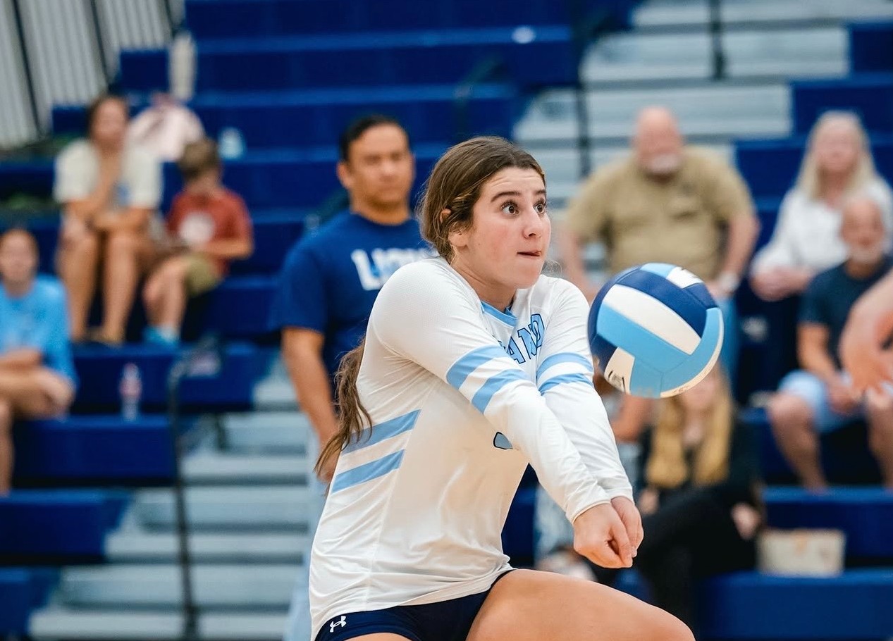 Ari hitting a volleyball